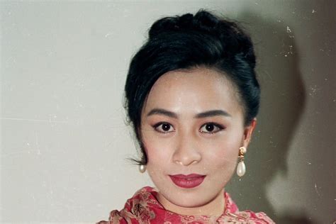 When a topless photo of kidnapped actress Carina Lau was。